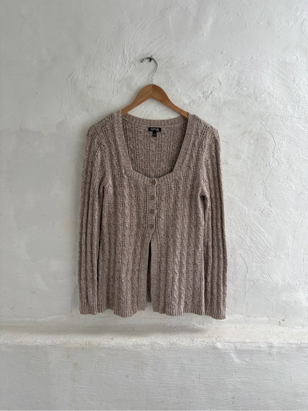 Y2K oatmeal-colored cable-knit babydoll
cardigan by Apt. 9